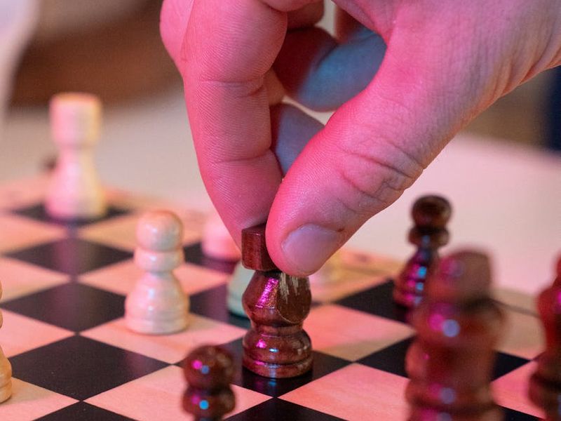A man moving through a sequence of exercises with focus and precision.
