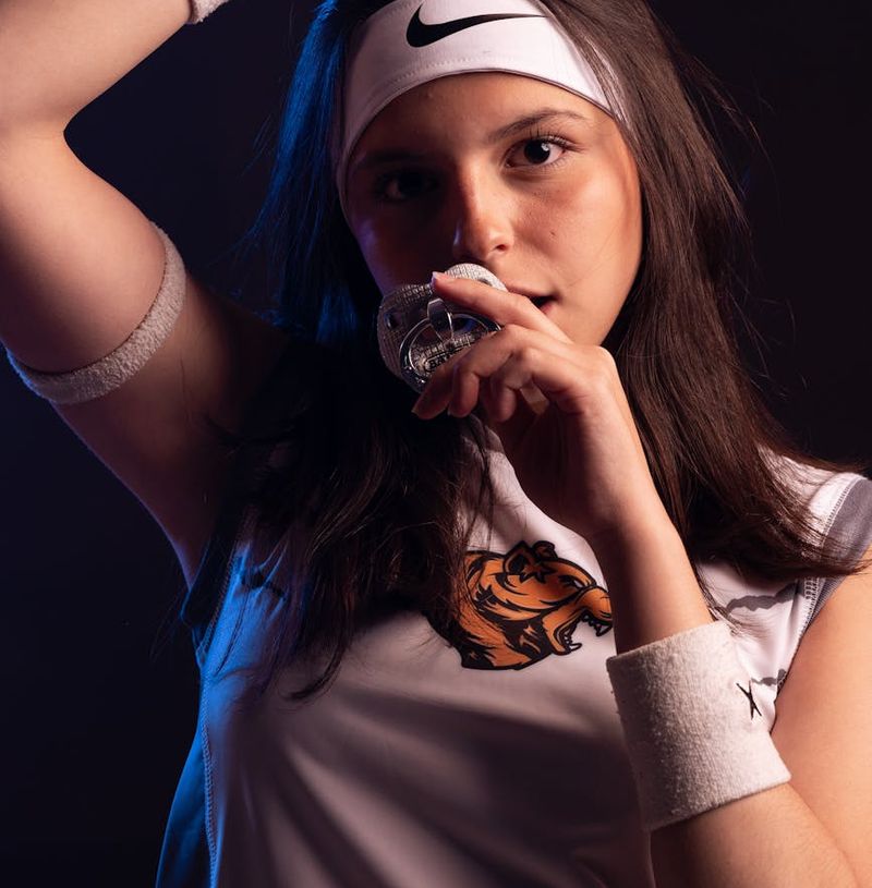 Close-up of an athlete's focused expression during a challenging pose.